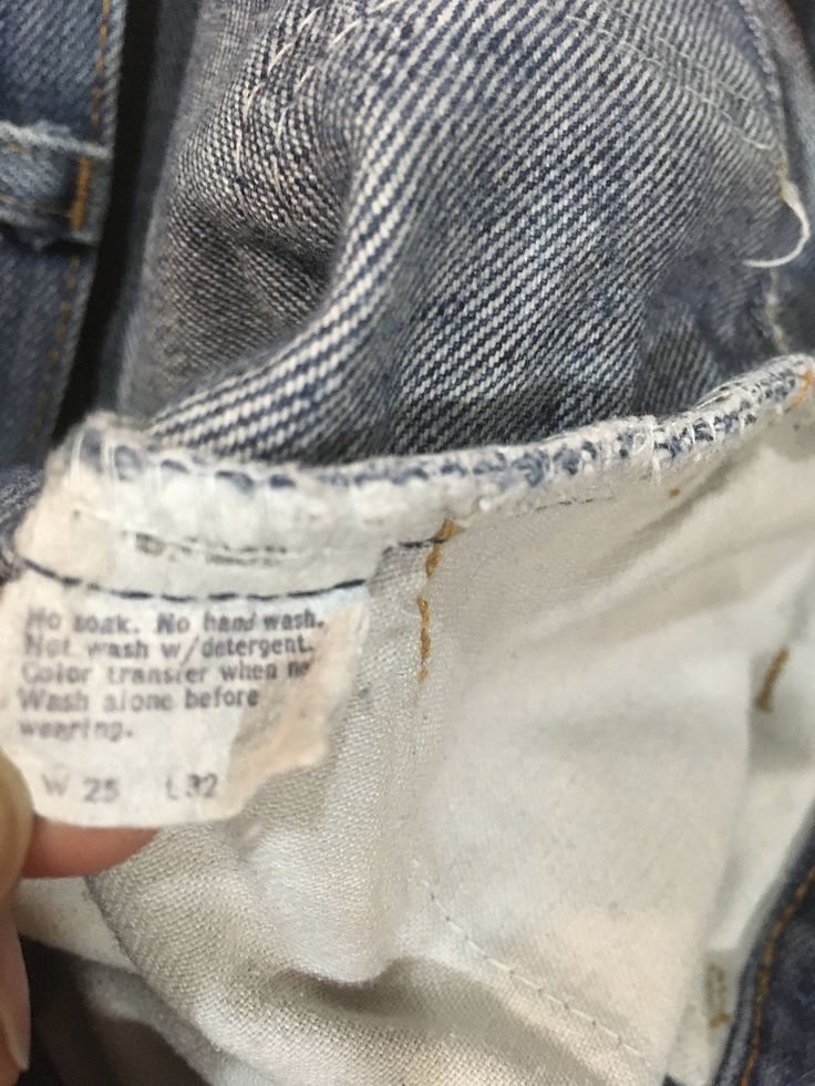 "1970s Levis bell bottom jeans made in USA orange tab SCOVILL zipper fly hemmed authentic age wear fade, fray, faded stains labeled 25 x 32, smaller/shorter, see below measures, lying flat, waist-12\" rise-10\" inseam-23 1/2\" hem-12\" hip-17 1/2\" out seam-33\" about 2\" could be added to length if unhemmed" Vintage Jeans With Medium Wash And Frayed Hem, Vintage Medium Wash Jeans With Frayed Hem, Vintage Denim Blue Jeans With Frayed Hem, Vintage Faded Jeans With Frayed Hem, Vintage Style Light Wash Flare Jeans, Vintage Jeans Medium Wash With Frayed Hem, Vintage Denim Flare Jeans With Frayed Hem, Vintage Jeans With Frayed Hem, Vintage Dark Wash Jeans With Frayed Hem