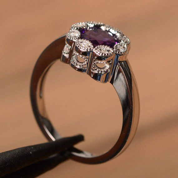 natural amethyst ring engagement ring February birthstone round cut gemstone sterling silver simple Elegant Amethyst Birthstone Ring With Prong Setting, Elegant Purple Crystal Ring With Prong Setting, Classic Amethyst Birthstone Ring In White Gold, Elegant Amethyst Crystal Ring Round Cut, Elegant Purple Birthstone Ring With Round Cut, Elegant Purple Round Cut Birthstone Ring, Classic Amethyst Cubic Zirconia Promise Ring, Elegant Purple Birthstone Ring, Classic Amethyst Round Cut Birthstone Ring