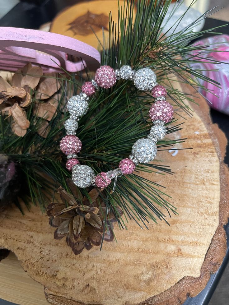 Description This stylish Pink & White Round Rhinestone Beaded Elastic/Stretch Bracelet is perfect for any fun-loving fashionista who enjoys making a statement. Blending classic elastic and sparkling rhinestones with acrylic beads, this bracelet is sure to turn heads! Shine on! Details Strand Length: 7" Bead Length: 2.5mm - 11.5mm Bead Width: 5.5mm - 12.5mm Acrylic Round Beads encrusted with Pink & White rhinestones Features One of a kind, fashion jewelry, everyday jewelry Great gift for that spe Jewelry Everyday, White Bracelets, Special Girl, White Rhinestone, Elastic Bracelet, Rhinestone Bead, Fun Loving, Rhinestone Bracelet, Pink Bracelet