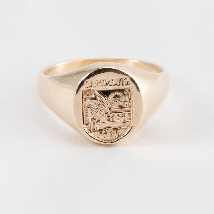 Hi. This is a nice Darmouth College Signet Ring in 14k Yellow Gold. It is marked 14k on the inside of the ring. It has the words "Darthmouth" and "1769". The ring finger size is 5.75. Sorry, we do not resize rings. The weight is 6 grams. Thanks for looking. Vintage Engraved Round Ring, Tarnish Resistant, Antique Dome Ring Stamped 14k As Gift, Antique 14k Stamped Rings For Gift, Oval Engraved Ring Stamped 14k For Anniversary, Vintage Sterling Silver Rings In Yellow Gold, Vintage Tarnish Resistant Initial Ring For Anniversary, Heirloom Engraved Ring Stamped 14k, Heirloom Style Open Ring Stamped 14k, Antique 14k Stamped Rings As Gift