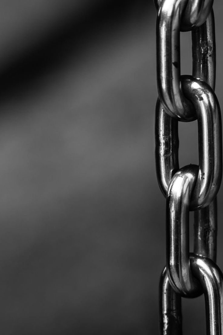 black and white photograph of a metal chain