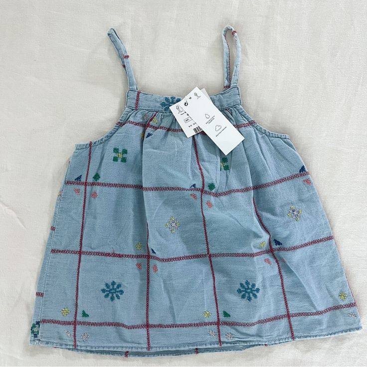 New With Tags. Zara Denim Embroidered Top. Size 4-5 Years. Cute Denim Blue Cotton Tops, Cute Denim Top For Spring, Embroidered Summer Tops For Playtime, Embroidered Cotton Top For Playtime, Light Blue Tops For Spring Playtime, Light Blue Tops For Playtime In Spring, Cute Blue Tops For Playdate, Cute Blue Top For Playdate, Embroidered Denim Blue Cotton Tops