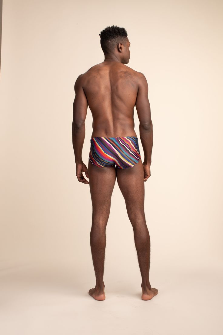 New! Mr. Turk South Beach Swim Trunk Ideal for your next vacation, this easy swim trunk features a colorful print, comfortable inner drawstring closure, and a fitted silhouette. A fierce new addition to your swim wardrobe, this men's swim short is ready for any adventure. Inner, adjustable drawstring Fitted Underseam: 3.75", Front rise: 8" Electric Reef Swim Print 83% Nylon, 17% Lycra Hand wash cold. Fabric from Portugal. Multicolor Fitted Swim Trunks For Pool, Casual Swim Trunks For Water Polo And Beach Season, Casual Swim Trunks For Water Polo, Multicolor Swim Trunks For Poolside, Fitted Multicolor Swim Trunks For Swimming, Beachwear Swim Trunks For Water Polo, Sporty Multicolor Swim Trunks For Beach Season, Beach Season Water Polo Swim Trunks, Multicolor Beachwear Swim Trunks For Poolside