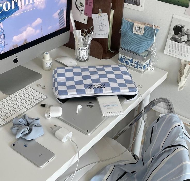 a desktop computer sitting on top of a white desk