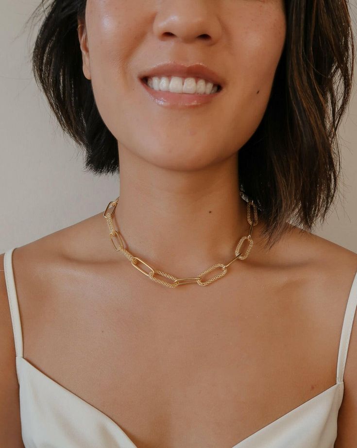 Elevate your style with our Chunky Paperclip Necklace. Its unique design features alternating smooth links and mesh links, adding a touch of versatility and sophistication. With a length of 16.5 inches plus a 2-inch extension, it's the perfect accessory to complement any neckline. Details: Metals: 14kt 1-Micron Gold-Plated on Sterling Silver Base Length: Adjustable 16.5-18.5in Chic Metal Necklaces With Rectangular Links, Chic Chunky Link Chain Necklace, Chic Chunky Chain Link Necklace, Chic Metal Necklace With Paperclip Chain, Trendy Chunky Chain Necklace With Rectangular Links, Chic Metal Paperclip Chain Necklace, Chic Metal Link Choker, Modern Necklaces With Chunky Chain, Modern Necklace With Chunky Chain Links