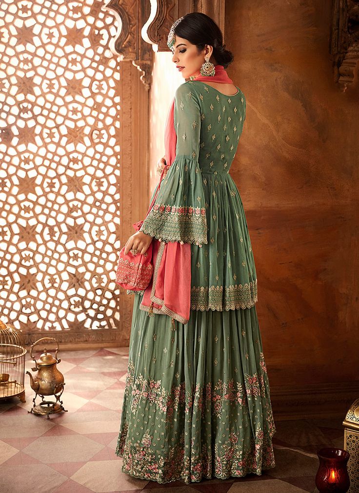 Sage Green & Coral Pink Designer Heavy Embroidered Georgette Sharara Suit-Saira's Boutique Fitted Green Georgette Palazzo Set, Fitted Green Palazzo Set With Floral Embroidery, Fitted Floral Embroidered Sharara For Eid, Embroidered Fitted Floor-length Palazzo Set, Fitted Green Palazzo Set With Chikankari Embroidery, Eid Fitted Palazzo Set With Intricate Embroidery, Fitted Green Palazzo Set With Resham Embroidery, Green Fitted Palazzo Set With Resham Embroidery, Green Georgette Sets With Intricate Embroidery