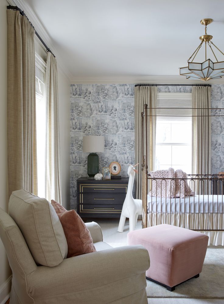 a baby's room is decorated in neutral colors