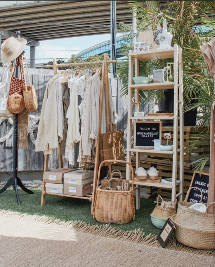 an outdoor market with lots of items on display