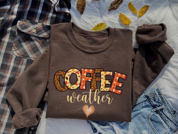 Our cozy sweatshirt is great for the fall season and those chilly days when al you need is a warm cup of coffee. It can also make the perfect gift for a coffee lover in your life, who enjoys the comfort of cool weather and their favorite brew. ⭐Fabric Our sweatshirts are made with a thick blend of 50% pre-shrunk, ring-spun cotton and 50%polyester that provides a soft, warm feel, perfect for those chilly days. ⭐ Sizing All of our shirts are UNISEX size and have a regular fit, offering a comfortable and relaxed silhouette with straight lines that follows the body's natural shape without being too tight or too loose. All hoodies and sweatshirts are fleece.  Please visit the listing photo chart to find the best fit for you, making sure you choose the right size before placing your order, to en Fall Coffee Cotton Sweatshirt, Casual Coffee-colored Winter Sweatshirt, Coffee Colored T-shirt With Funny Print In Relaxed Fit, Everyday Coffee-colored T-shirt With Text Print, Everyday Coffee T-shirt With Text Print, Natural Shapes, Cozy Sweatshirts, Coffee Lover Gifts, Coffee Lover