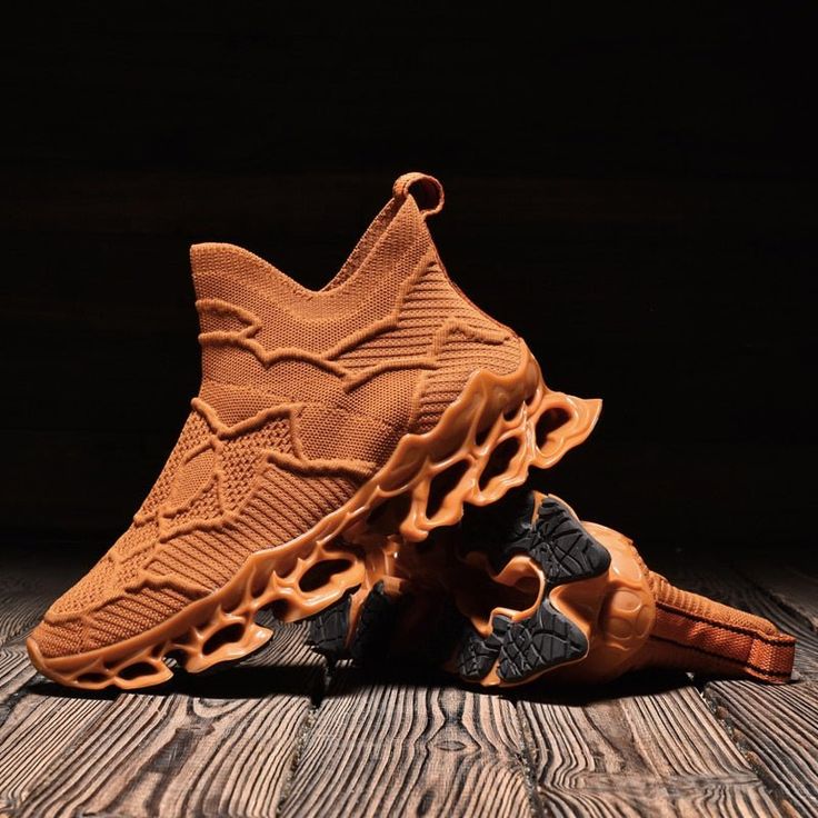 a pair of shoes on top of a wooden floor