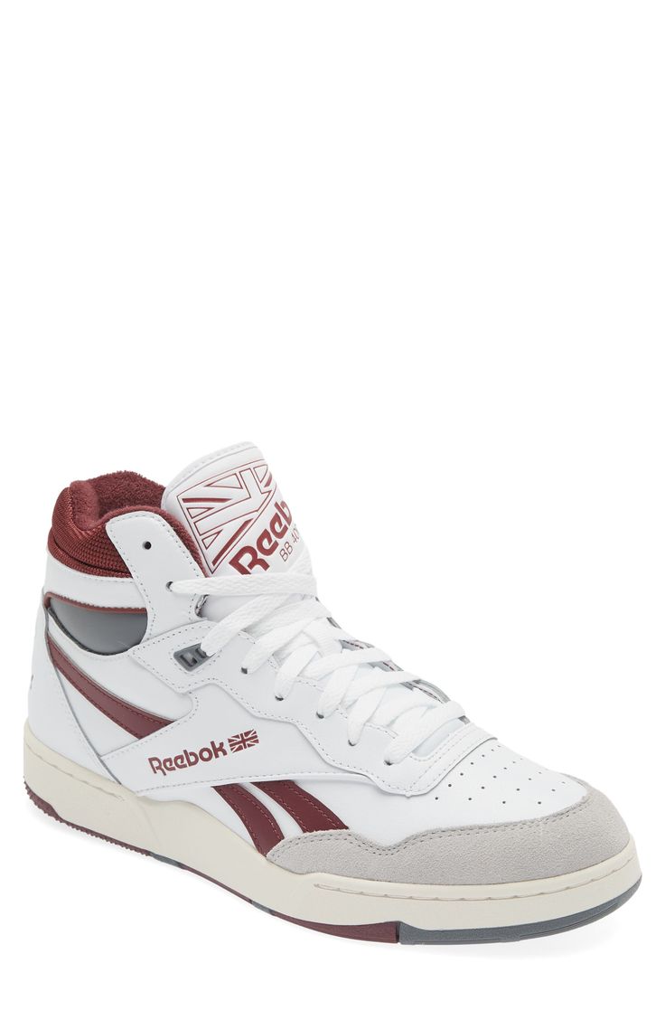 This street-ready mid-top sneaker has a basketball-inspired silhouette with a leather upper sporting suede details and an off-the-hardwood feel. Lace-up style Cushioned footbed Leather upper/synthetic lining/rubber sole Imported Throwback High-top Sneakers With Boost Midsole For Streetwear, White Throwback High-top Sneakers With Rubber Sole, Throwback High-top Basketball Shoes With Boost Midsole, Throwback High-top Basketball Shoes With White Sole, Throwback Mid-top High-top Sneakers With Gum Sole, White Throwback High-top Skate Shoes, Throwback High-top Skate Shoes With Boost Midsole, White High-top Throwback Skate Shoes, White High-top Throwback Sneakers