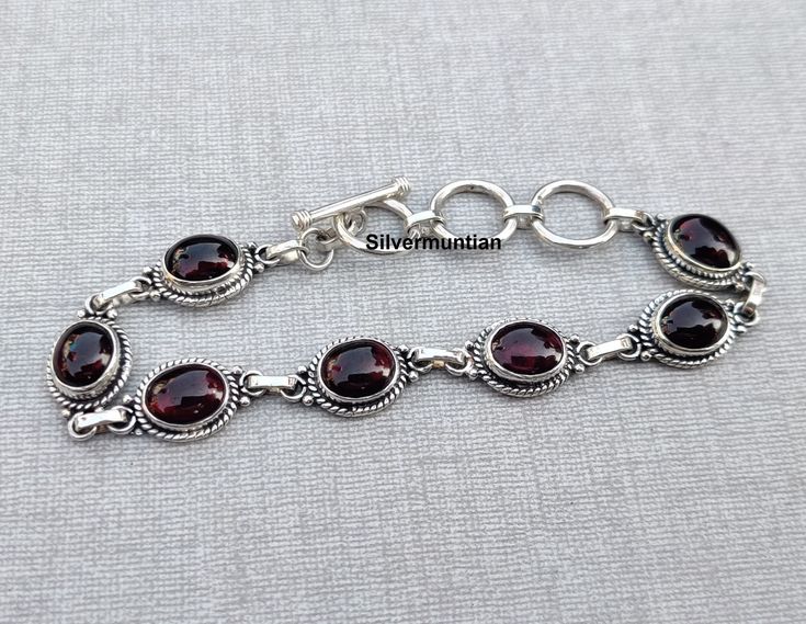 Natural Garnet Gemstone Bracelet* Oval Shape Bracelet* 925 Sterling Silver Bracelet* Adjustable Bracelet* Amazing Bracelet* Gift For Love ---------------------------------------------------------------------------------------------------------------------------------------------------- Description Metal :- 925 Sterling Silver Style : Bracelet Benefits Of Garnet    Garnet is an excellent gemstone to regulate blood circulation in body. ... It has the property to reduce the chances of hemorrhages a Chakra Racine, Gift For Love, Garnet Bracelet, Jewelry Accessories Ideas, Funky Jewelry, Jewelry Lookbook, Silver Style, Garnet Gemstone, Gothic Jewelry