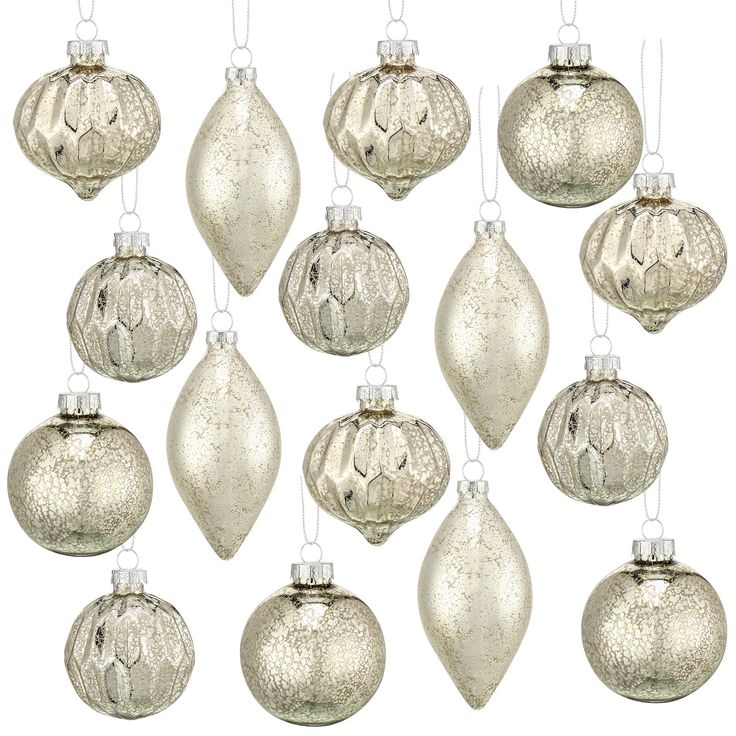 twelve silver glass christmas ornaments hanging from strings