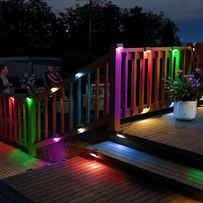 colorful lights are lit up on the deck