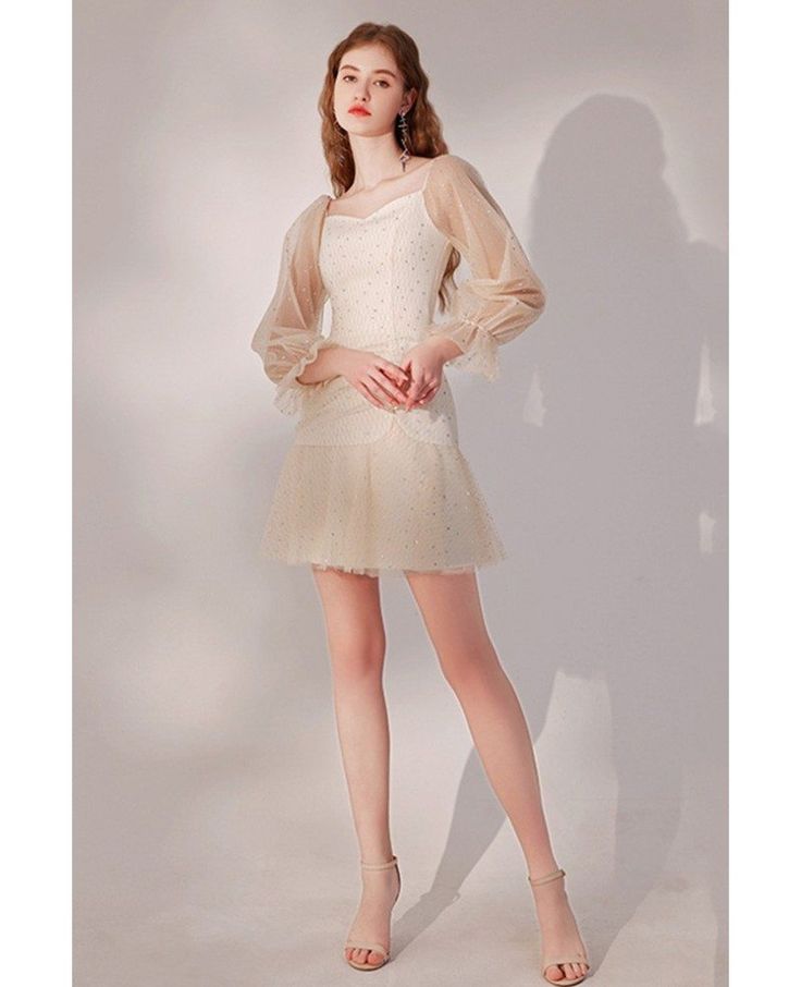 Buy champagne sequined short tulle hoco dress with long sleeves high quality at affordable price online. Free shipping and pro custom service since 2009. Long Sleeve Tulle Dress For Night Out, Long Sleeve Tulle Mini Dress For Evening, Long Sleeve Mesh Dress For Prom, Prom Mini Dress With Sheer Sleeves, Long Sleeve Prom Dress With Mesh Sleeves, Mini Dress With Sheer Sleeves For Prom, Long Sleeve Dress With Mesh Sleeves For Prom, Sheer Sleeved Mini Dress For Prom, Champagne Mini Dress For Spring Prom