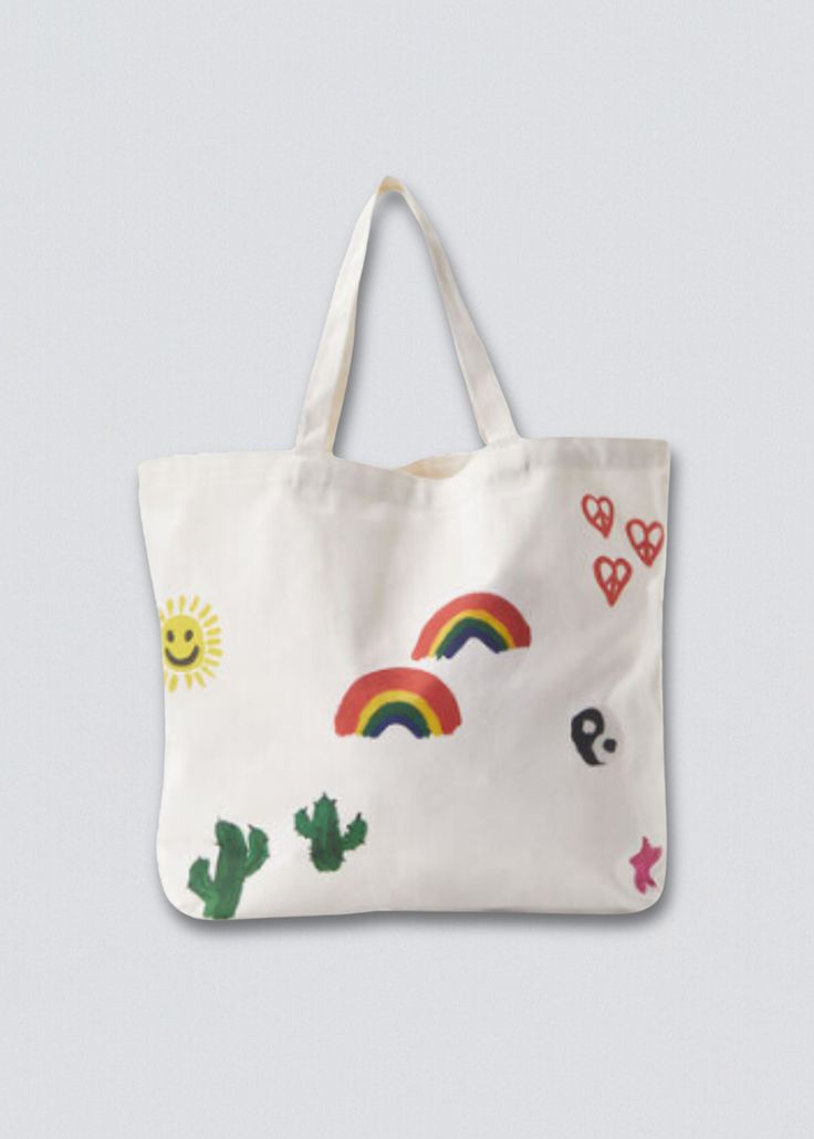 Elevate your everyday with our Art Doodles Tote Bag, showcasing a playful array of smiley faces, snakes, cherries, stars, heart peace signs, cacti, and rainbows – all in a unique Coney Island Picnic design. This screen-printed tote, with twin carry handles, offers the perfect size for your every need – from back-to-school essentials to convenient grocery trips. Make a statement while carrying it all. 100% Cotton Canvas Allover screen print front and back Return Policy Shipping Policy Playful Handmade Everyday Bags, Playful Everyday Shoulder Bag, Casual Hand Painted Bags For Daily Use, Casual Hand Painted Bags For Everyday, Trendy Hand Painted Bags For Daily Use, Casual Everyday Hand Painted Bag, Fun Canvas Bags For Everyday Use, Casual Hand Painted Canvas Bag For Everyday Use, Artsy White Everyday Shoulder Bag