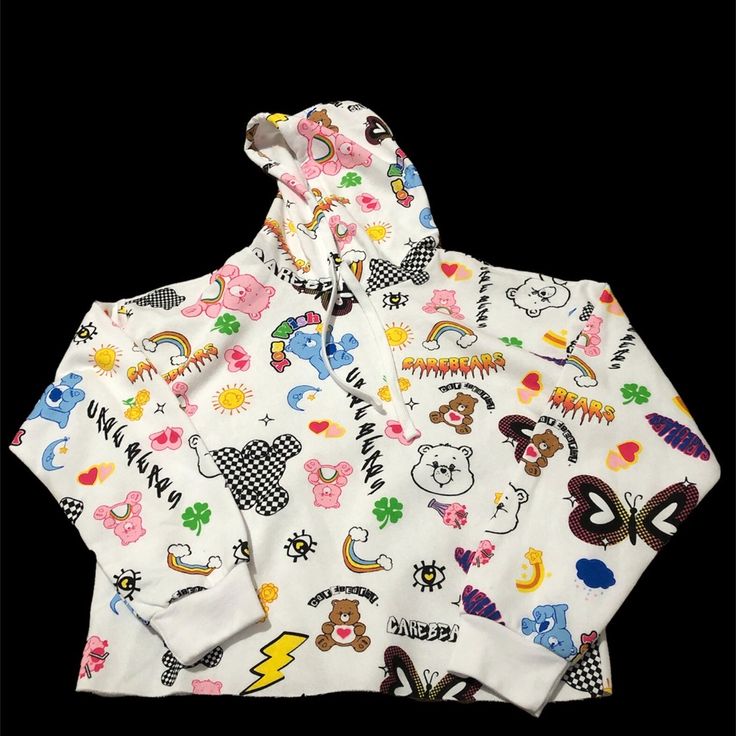 Care Bear Hoodie Playful White Hoodie For Streetwear, Playful Fall Streetwear Tops, Spring Cartoon Print Sweatshirt For Streetwear, Cute Hooded Top With Graphic Print, Spring Cotton Hoodie With Cartoon Print, Spring Cartoon Print Hoodie Top, Playful Hooded Hoodie For Streetwear, Trendy Cartoon Print Hoodie Top, Cotton Hoodie With Cartoon Print For Spring