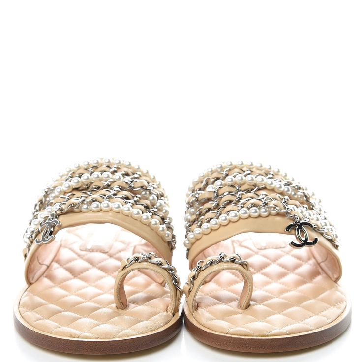 Brand New, Never Worn Beautiful Chanel Pearl Detailed Sandals.. These Stylish Slip On Sandal Slides Feature A Quilted Leather Midsole With Beige Uppers Accented By Silver Leather Treaded Chains, Pearl Chains And Silver Cc Charms.. These Are Excellent Shoes For A Timeless Look.. Beige Flat Sandals For Evening, Designer Toe Post Sandals For Spring, Luxury Sandals With Single Toe Strap For Spring, Designer Leather Flip Flops For Summer, Luxury Round Toe Sandals For Summer, Luxury Leather Open Toe Flip Flops, Designer Toe Post Sandals For Summer, Designer Toe Post Sandals, Designer Single Toe Strap Sandals For Summer