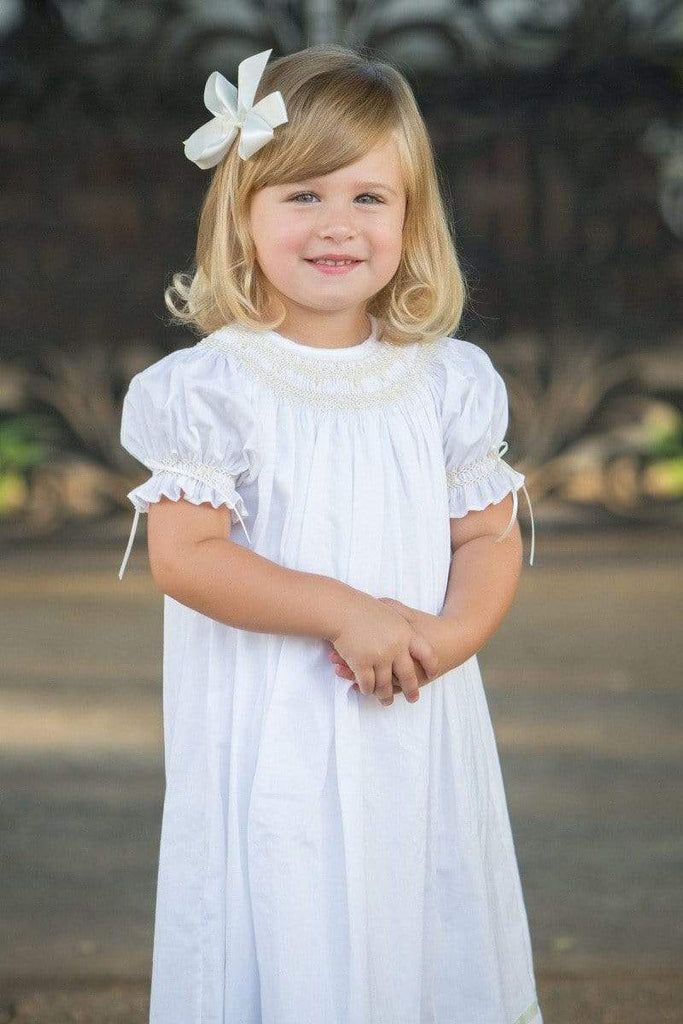 Toddler Flower Girl Dress Vintage Smocked Dresses Heirloom White Ivory Elegant Fitted Smocked Dress With Lace Trim, Elegant Smocked Dress With Smocked Cuffs For Baptism, White Lace Trim Smocked Dress For Daywear, White Smocked Dress With Lace Trim For Daywear, Elegant White Smocked Dress With Lace Trim, Elegant Smocked Ruffle Dress For Baptism, Elegant Baptism Dress With Smocked Bodice, White Bishop Sleeve Dress With Smocked Cuffs, Elegant Fitted Baptism Dress With Smocked Bodice