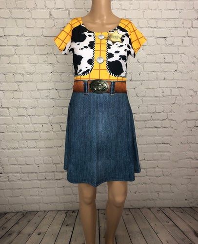 a mannequin wearing a dress with a cow print on it's chest