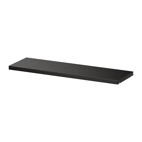 a black shelf on a white background