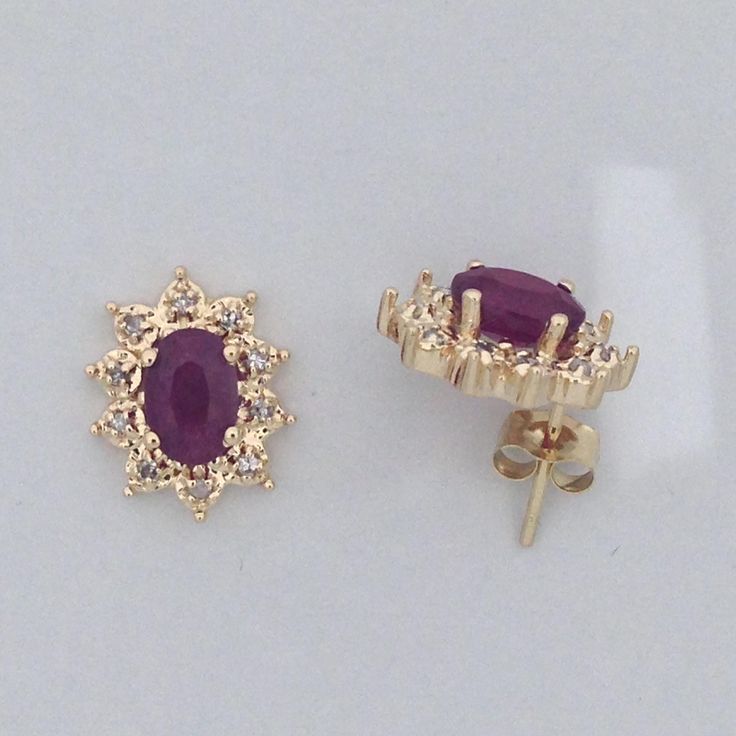 "SOLID 14KT YELLOW GOLD EARRINGS NATURAL RUBY IS 6x4 mm OVAL SHAPE EACH NATURAL DIAMOND IS 0.10 TCW EARRING LENGTH IS 11.55 mm (0.46\" inch) EARRING WIDTH IS 9.30 mm (0.37\" inch) WITH GIFT BOX" Yellow Gold Oval Earrings With Prong Setting, Classic Ruby Earrings In Yellow Gold, Classic Gold Ruby Earrings, 14k Yellow Gold Oval Diamond Earrings, Yellow Gold Ruby Jewelry With Halo Setting, Gold Gemstone Diamond Earrings For Anniversary, Gold Diamond Gemstone Earrings For Anniversary, Gold Ruby Jewelry With Prong Setting, 14k Yellow Gold Diamond Gemstone Earrings