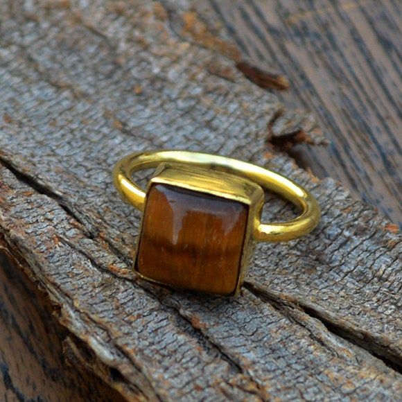 Natural Tiger Eye Gemstone gold ring, 14k yellow gold Chalcedony ring, Tiger Eye jewelry,beautiful gift, gold ring, gift fot her, Tiger Eye The 14K yellow solid gold bezel and solid yellow gold ring are both shined to an extremely high polish. All rings are packaged and shipped in a beautiful ring box. The main stone is natural, shiny, Tiger Eye. Gemstone Size Approx : 9 mm The pictures have been enlarged to show the details. The price is for a 14k gold ring, if you want to order the ring in 18k Gold Rings With Gemstone In Brass, Fine Jewelry 14k Gold Brown Ring, 14k Gold Brown Ring, Brown 14k Gold Fine Jewelry Ring, Brown 14k Gold Rings Fine Jewelry, Brown Gemstone Rings In 14k Gold, Gold Rings With Rectangular Gemstone, Gold Crystal Ring With Gemstone In 14k Gold, Gold Ring With Rectangular Stone