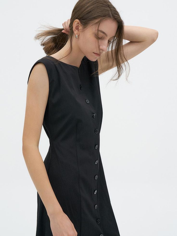 This is a trendy and feminine dress by Lamerei that is made out of high quality and sturdy material. With distinctive mood of the design and modern feminine look, you can style it for your comfortable daily outfit.- Boat neckline- Side pocket and buttons on the front- Feminine and modern mood Black Buttoned Midi Dress For Work, Black Midi Dress With Buttons For Work, Black Buttoned Work Dress, Black Midi Dress With Button Closure For Work, Summer Dresses For Office Wear With Buttons, Summer Office Dresses With Buttons, Black Buttoned Dress For Office, Summer Office Wear Dresses With Buttons, Fitted Mini Dress With Button Back For Work