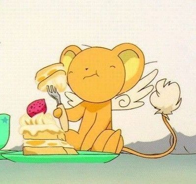 a cartoon image of a monkey eating cake