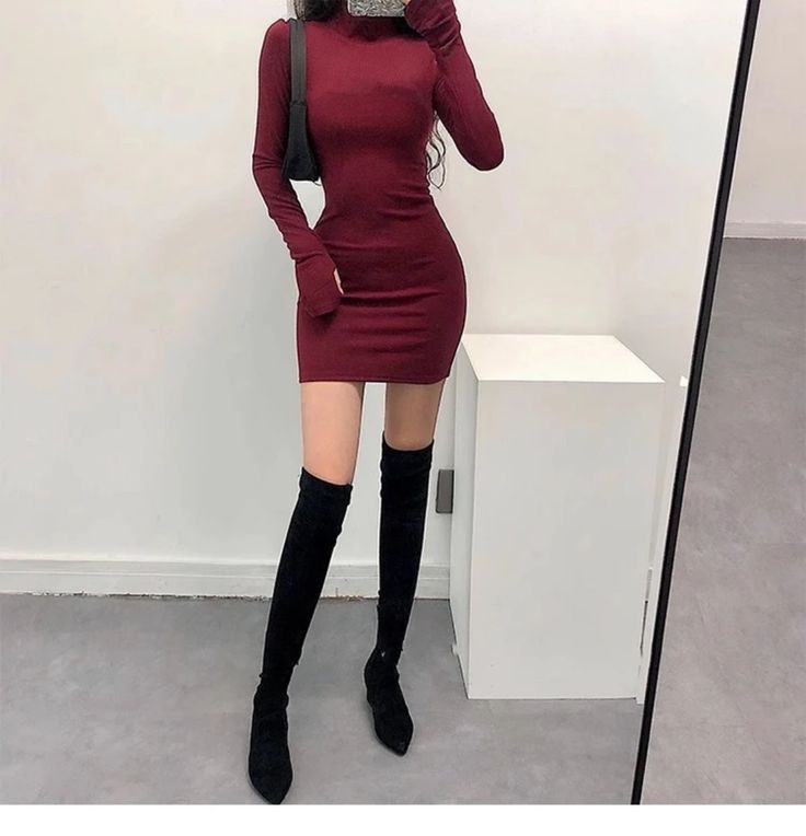 This dress features a slight stretch in its fabric for added comfort, with a regular sleeve style and a polyester fabric type. The solid pattern adds a touch of elegance, while the slim fit creates a flattering silhouette. Its turtleneck design is accompanied by no decoration for a simple yet stylish look. This dress falls above the knee in a mini length, made from a combination of cotton, polyester, and acrylic materials. It is made in Mainland China, specifically in Guangdong, and is suitable Elegant Solid Color Winter Bodycon Dress, Long Sleeve Elastane Dress For Winter, Sleek Long Sleeve Mini Dress For Fall, Winter High Neck Stretch Long Sleeve Dress, Formal Long Sleeve Elastane Bodycon Dress, Long Sleeve Elastane Bodycon Formal Dress, Fitted Solid Color Bodycon Dress For Work, Winter Sheath Bodycon Dress With Stretch, Winter Workwear Fitted Bodycon Dress