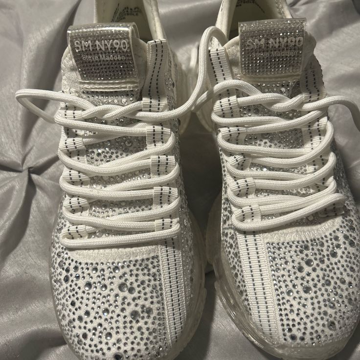 Brand New White Steve Madden Sparkle Sneakers Size Says 8 But Will Fit More Like Size 7 Slip-on Synthetic Sneakers With Rhinestones, Sporty Low-top Rhinestone Sneakers, Sporty Low-top Sneakers With Rhinestones, White High-top Sneakers With Rhinestones, White Rhinestone Round Toe Sneakers, Sporty High-top Sneakers With Rhinestones, Low-top Synthetic Sneakers With Rhinestones, Sporty White Sneakers With Rhinestones, Trendy Low-top Sneakers With Rhinestones