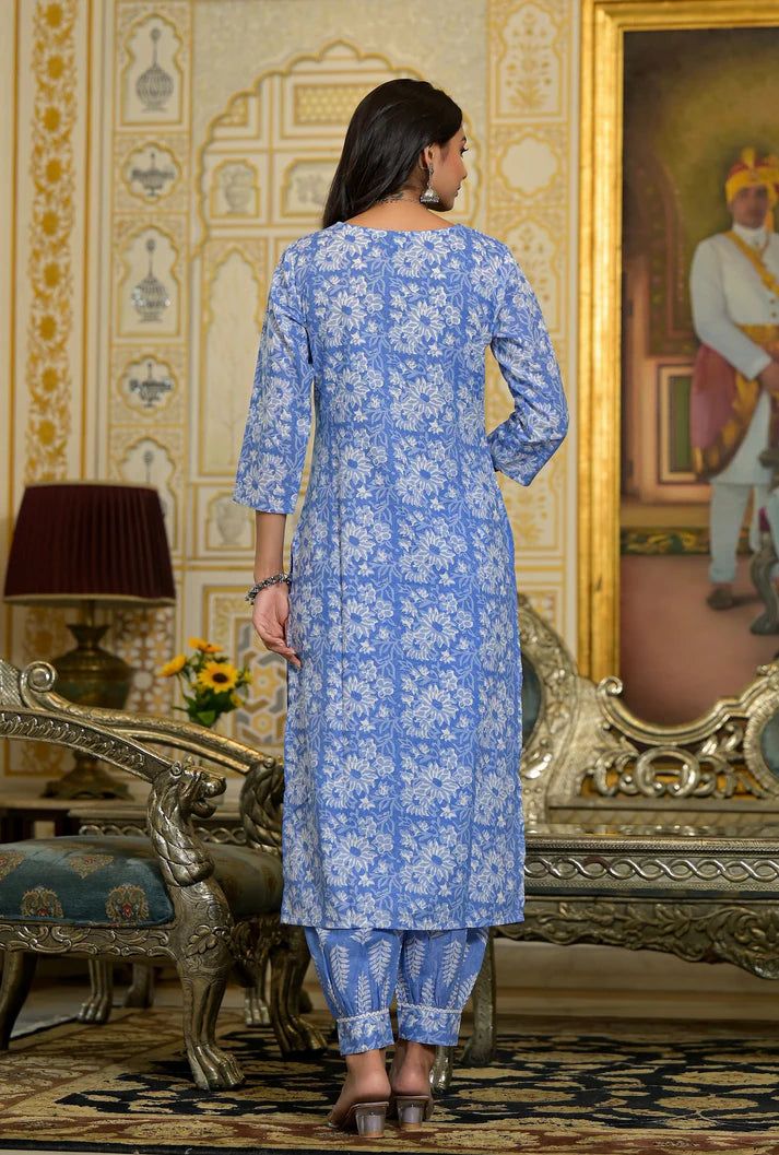 Grab this beautiful 3-piece set. The set comes with printed & embroidered kurta has round neck; 3/4th sleeves & calf length teamed with matching trouser pant and a chanderi cotton dupatta. Color - Blue Kurta Fabric-Viscose Pant Fabric-Viscose Dupatta Fabric - Chanderi Cotton Neck-Round Neck Sleeves-3/4th Sleeves Work - Print & Embroidery Detailing Washing Instructions-Dry Clean Model Height - 5.5 wearing size small. DISCLAIMER - The color of the product may be differ due to screen settings of device. A misprint here and a color drop slip there is the beauty of printing which is not treated as a defect. Spring Straight Kurta Sets With Printed Motifs, Fitted Cotton Pant Set With Printed Motifs, Festive Fitted Sets With 3/4 Sleeve, Anarkali Style Printed Straight Kurta Sets, Festival Anarkali Set With Printed Details, Festival Anarkali Set With Prints, Festive Printed Straight Kurta Sets, Festive Printed Straight Kurta Pant Set, Festive Kurta With Printed Motifs And 3/4 Sleeves