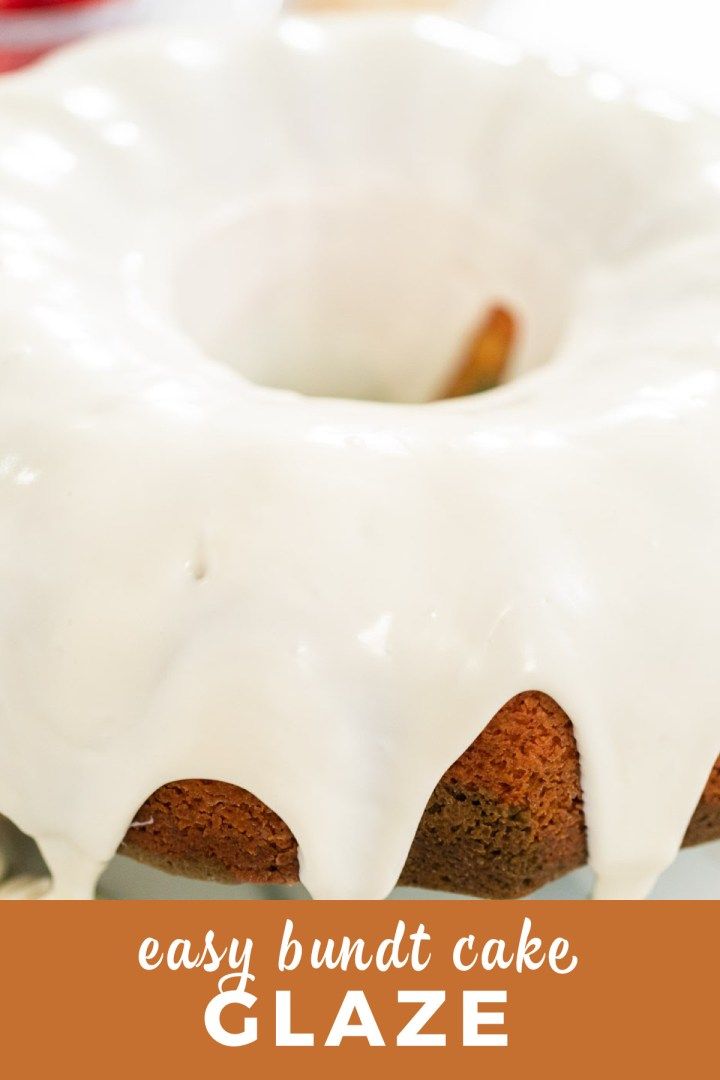 a bundt cake with white icing sitting on a plate