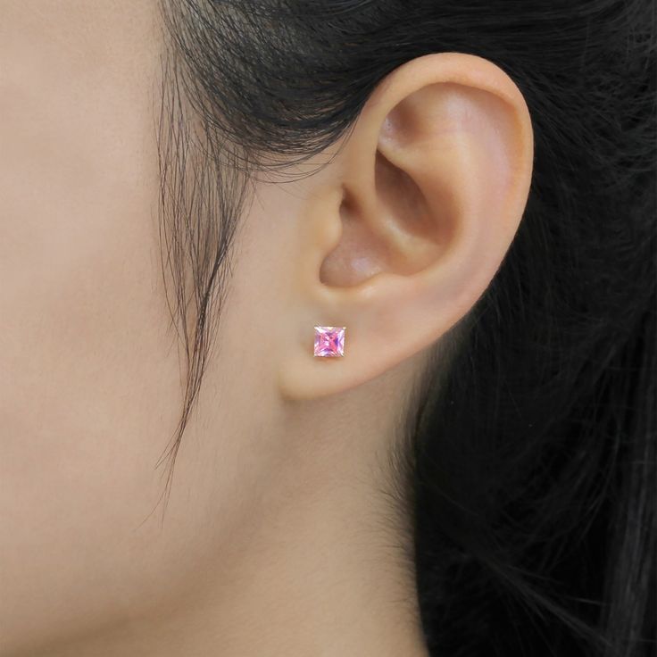 SKU : DJBSQ4010 This 14K Yellow Gold Pink Cubic Zirconia Basket Set Solitaire Cartilage Stud Earrings is a meticulously crafted and beautiful earring. Specifications Metal color: 14K Yellow Gold Dimensions: Available in 4 mm, and 5 mm Stone Shape: Princess Stone Color: Pink Material: Solid 14K Gold Our stones are the highest quality diamond simulants that are polished, finely cut, loupe clean, and have an exactly similar appearance and as beautiful as to naturally occurring diamonds. All cubic z Pink Tarnish-resistant Round Jewelry, Dainty Pink Gold Jewelry For Everyday, Pink Gold Cubic Zirconia Jewelry With Prong Setting, Fine Jewelry In Pink Gold With Diamonds, Classic Round Cut Pink Gold Jewelry, Classic Pink Gold Round Cut Jewelry, Formal Pink Gold Jewelry With Prong Setting, Classic Pink Gold Jewelry For Anniversary, Gold Plated Pink Gold Round Jewelry