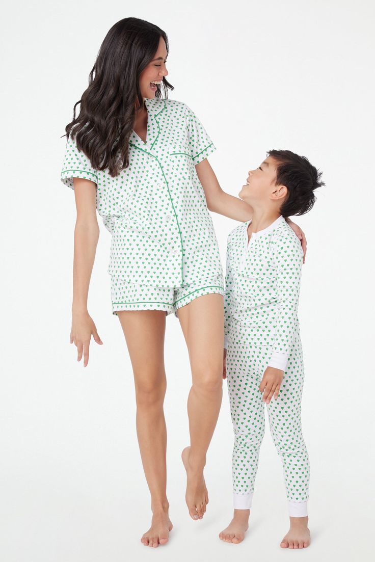 We're all looking forward to bedtime stories in these adorable Hearts Pajamas! With oh-so-comfy 100% premium cotton, this matching top and bottom set is perfect for slumber parties. And a match your mini moment?! Doesn't get sweeter than that! 3 Button Henley Elastic Waist Super-Smooth Flatlock Seams Runs Small; Please Size Up Materials and Care 100% Long-Staple Premium Cotton Cold Wash, with like colors. Do not bleach Tumble dry low (Line dry recommended). Warm iron if needed Imported Prewashed Playful Cotton Sleepwear For Pajama Party, Cotton Pajama Shorts Matching Set For Sleep, Family Matching Cotton Sleepwear For Sleepovers, Playful Relaxed Fit Sleepwear, Cotton Matching Set Pajama Shorts For Loungewear, Cotton Matching Set Tops For Pajama Party, Cotton Sleepwear Matching Set For Sleepover, Playful White Pajama Shorts For Loungewear, Family Matching Cotton Sleepwear