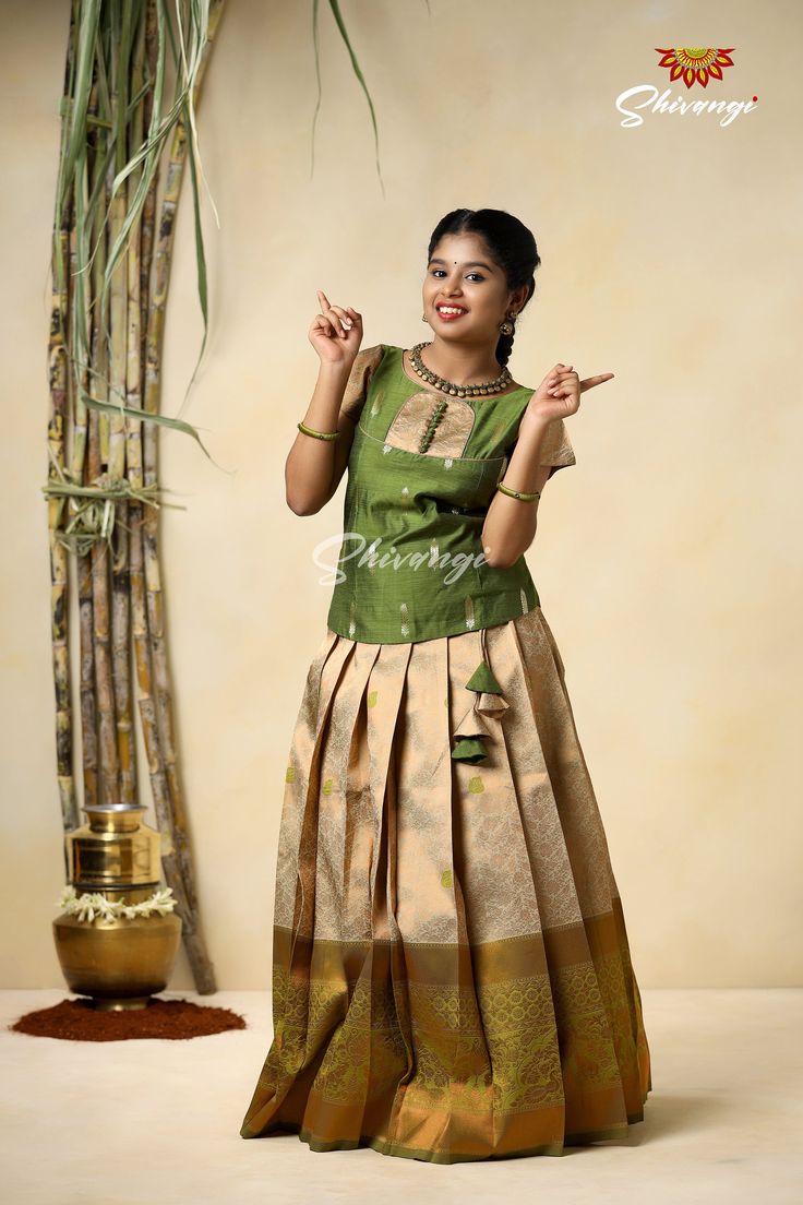 Traditional Green Semmal Pattu Pavadai For Girls Quick overview :  Skirt Color  : Green  Sleeve Type : Normal Sleeve Material      : Banaras Wash Care  : Dry wash | Do not wrinkle | Low iron. Pavada Sattai Designs For Women, Pavadai Sattai Designs Women, Pattu Pavadai Designs Women, Pattu Pavada Women, Pattu Pavadai Kids Blouse Designs, Pavadai Sattai Designs, Pattu Pavadai Designs, Pattu Pavada, Baby Lehenga