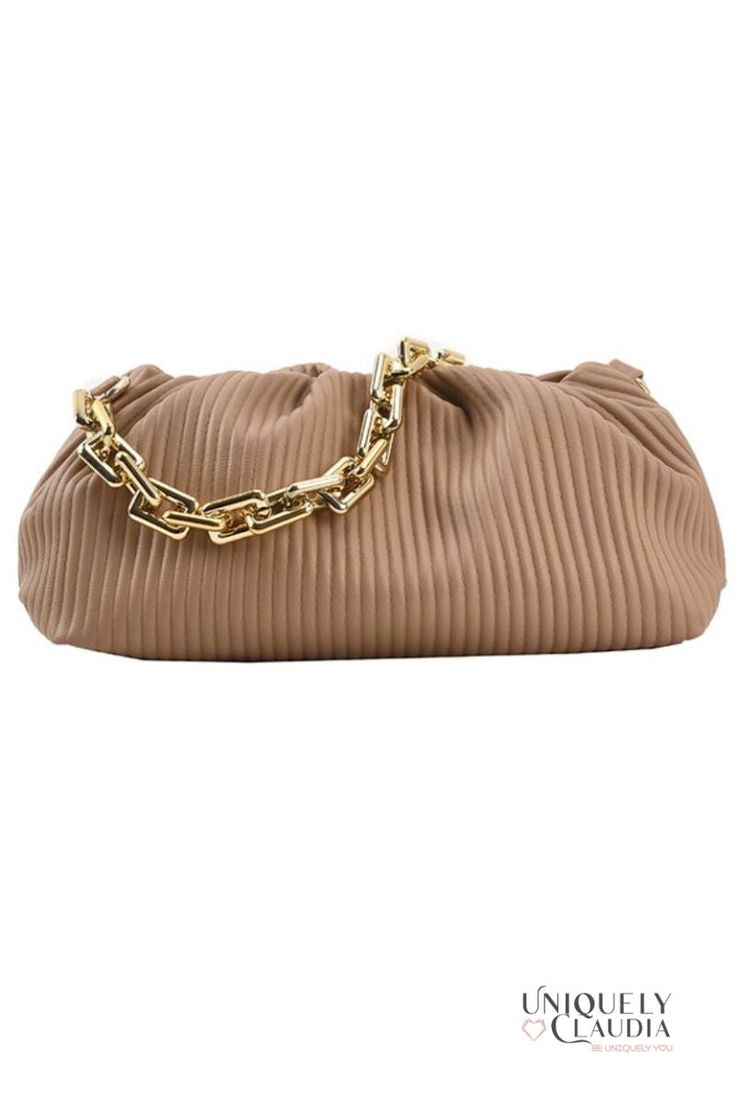 Gorgeous and unique to take your style up a notch...check out our Shaune Pleated Handbag – it's chic, sophisticated, and totally on trend. This ultra-soft vegan leather bag comes with two straps, and it is a 3-in-1...it can me worn as a clutch, under-shoulder, or crossbody. A goldtone bold chainlink, and a crossbody strap that lets you go hands-free. Plus, the pleated design is both eye-catching and elegant, and the handbag itself is spacious enough to hold all your essentials. Whether you're he Elegant Brown Baguette Bag For On-the-go, Chic Soft Leather Travel Clutch, Trendy Large Capacity Leather Clutch, Chic Rectangular Hobo Bag With Chain Strap, Chic Hobo Shoulder Bag With Chain Strap, Trendy Beige Soft Leather Baguette Bag, Chic Bags With Chain Strap And Double Handle, Chic Faux Leather Baguette Bag For Everyday Use, Trendy Everyday Clutch With Large Capacity