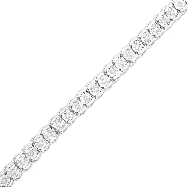 Wrap your wrist in a classic and shimmering style with this diamond tennis bracelet in sterling silver. Crafted in sterling silver Each diamond in this continuous line is artfully set to enhance size and sparkle. Radiant with 1/4 ct. t.w. of diamonds This 7.25-inch bracelet secures with a box clasp. Classic Silver Tennis Bracelet With Single Cut Diamonds, Classic Silver Channel Set Diamond Bracelet, Classic Silver Tennis Bracelet With Channel Set, Timeless White Sterling Silver Bracelet With Diamond Accents, Silver Diamond Channel Set Bracelet, White Gold Channel Set Tennis Bracelet For Anniversary, Silver Diamond Bracelet With Channel Set, Classic White Sterling Silver Bracelet With Diamond Accents, Silver Channel Set Diamond Bracelet