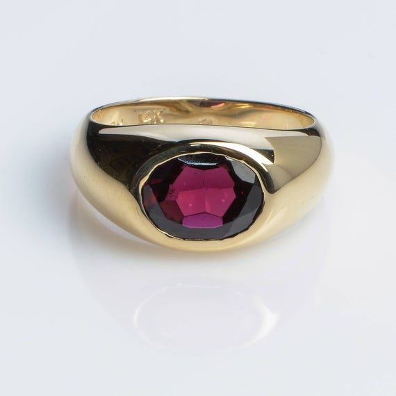 14K Yellow Gold Handmade Classic Ring with Garnet, elegant, timeless.► 14K Yellow Gold► Garnet stone 8x6 mm► Size 8 (Can be customized)► Total Weight 6.2 grAll items are Handmade, I pay a lot of attention for every detail in the jewelry I design.All of my items are hand crafted in Kisufim's Designer jewelry Store in Tel Aviv, and shipped direct to customers all over the world. I am proud to say that many celebrities, models and stars across the world wear my jewelry.►► FREE worldwide shipping, S Luxury Domed Gemstone Ring, Elegant Gemstones With Bezel Setting For Formal Occasions, Formal Round Gemstones With Polished Finish, Elegant Bezel Set Gemstones For Formal Occasions, Elegant Formal Gemstones With Bezel Setting, Formal Signet Ring With Polished Round Stone, Luxury Gemstones With Bezel Setting For Formal Occasions, Formal Signet Ring With Polished Finish, Classic Formal Gemstones With Polished Finish