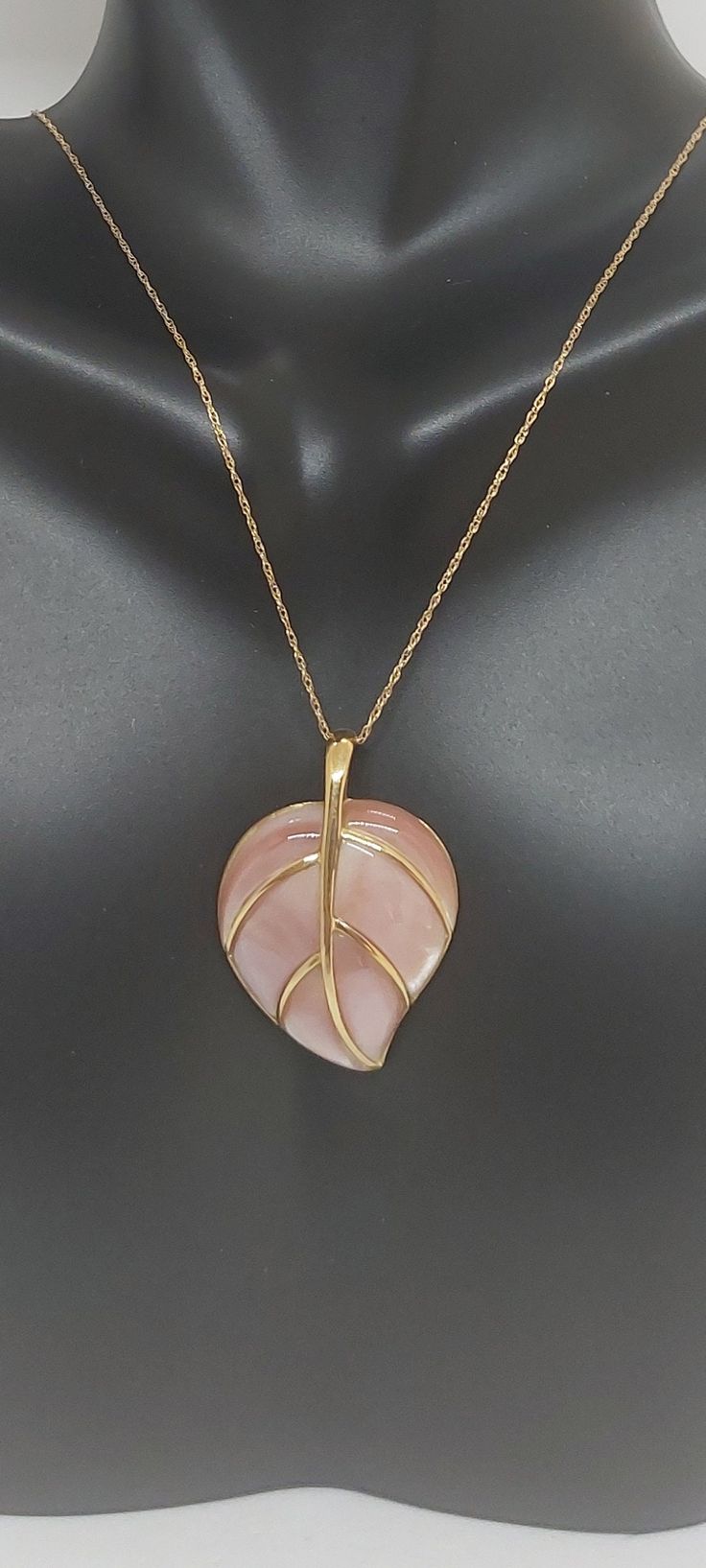 "PINK Mother of pearl Leaf Pendant 14k Yellow Gold 18\" ROPE Chain. Pink LEAF Mother of Pearl Pendant / Necklace. Mother of Pearl Lover. -Product Info: -Pendant Measurement: 30x20mm -Stone: Mother of Pearl. -Stone Color: Pink. -Metal: 14k Yellow Gold. -Chain length: 18 Inches Rope Chain.  -Nice Gift Box Include" Formal Pink High Luster Necklace, Pink Pearl Pendant Jewelry For Anniversary, High Luster Pink Jewelry For Anniversary, Pink Pearl Pendant Jewelry For Gift, Pink Pearl Gemstone Necklace As Gift, Pink Pearl Necklace With Gemstone For Gift, Pink Gemstone Pearl Necklace For Gift, Mother Of Pearl Pendant, Pearl Stone