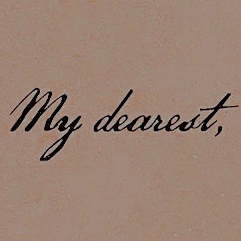 the word my dearest written in cursive writing