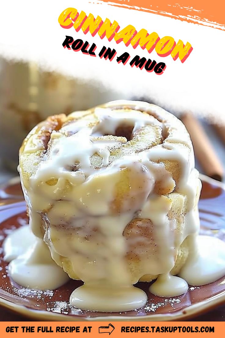 a cinnamon roll on a plate with icing drizzled around it's edges