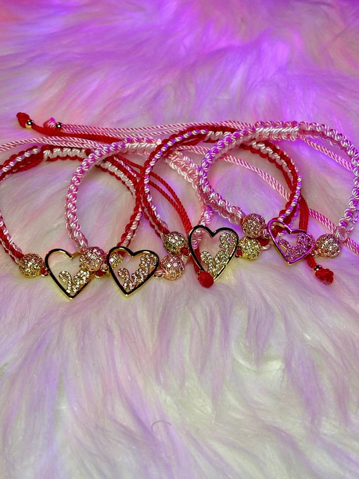 Embrace the warmth of love with our Valentine's Macrame bracelet, adorned with exquisite 18k gold fill charms—a timeless symbol of cherished moments and everlasting romance. What you get: 1 Bracelet One size fits most 6 1/2 wrist and up Adjustable Gold Bracelet For Valentine's Day, Adjustable Beaded Bracelets With Heart Charm For Wedding, Valentine's Day Adjustable Gold-plated Jewelry, Adjustable Rose Gold Promise Bracelet, Anniversary Charm Bangle Bracelet For Valentine's Day, Valentine's Day Gift Heart Bangle Bracelet, Valentine's Day Anniversary Charm Bangle Bracelet, Anniversary Bangle Charm Bracelet For Valentine's Day, Adjustable Silver Heart Bracelet Gold Plated