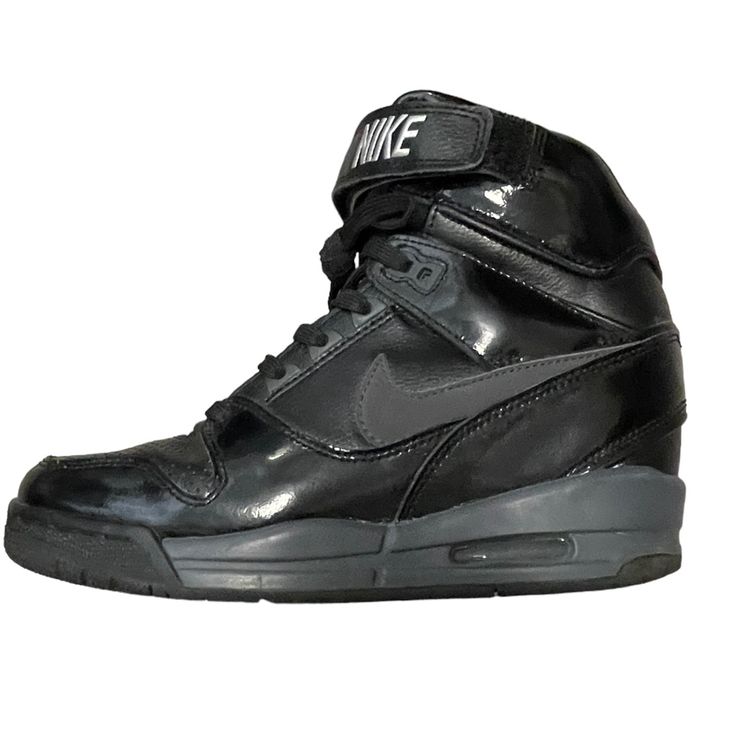 Women’s Nike Air Revolution Sky Hi Sneakers Black Leather & Patent Leather 7.5 Get Your Height In Style With These Sneakers! Minimal Signs Of Wear. Minimal Scuffs Here And There, But Are As Pictured. The Scuffs Are Hard To See. High-top Synthetic Wedge Sneakers With Height Increase, Sporty High-top Wedge Sneakers With Height Increasing Feature, Sporty High-top Wedge Sneakers With Height Increase, Sports Wedge Sneakers With Boost Midsole And Round Toe, Sporty Wedge Heel Sneakers For Sports, Sporty Wedge Sneakers For Sports, Leather High-top Platform Sneakers For Sports, Leather Platform High-top Sneakers For Sports, Sporty Wedge Sneakers With Boost Midsole And Round Toe