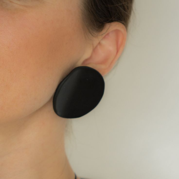 "Black MOON" / "White MOON"  Large White Handcrafted Clay Statement Earrings for women and girls. Minimalist Simple Geometric Design Earring Studs, handmade with natural clay: - are wearable mini-sculptures, - are very lightweight, - possess a pleasantly textured surface - available with Stainless Steel, or hypoallergenic Surgical Stainless Steel  These large round white earrings are simple and modern, a perfect accessory for any occasion and any outfit. ▪ ▪ ▪ ▪ ▪ GIFT IDEA: Black / White Stud E Minimalist Handmade Black Earrings, Minimalist Black Single Plug Earring, Handmade Black Round Earrings, Modern Black Plug Earrings As Gift, Minimalist Black Plug Earrings For Gift, Single Black Round Earring, Modern Adjustable Black Earrings, Simple Geometric Designs, Clay Sculptures