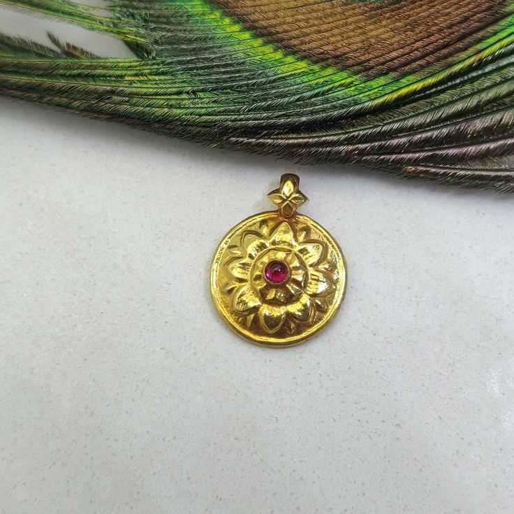 18k Yellow Gold Charm Pendant With Ruby Color Stone, Handcrafted 18k Gold Pendant Size 15mm, Gold Pendant Finding, Christmas Jewelry, KC1557 Thank you for visiting this site! Beautiful handmade 18K Gold charm with Ruby for your exclusive handmade designs! Country of Manufacture: India Metal: Gold Size: 15 MM Stone: Hydro Ruby Metal Purity: 18K Color: Yellow Shape: Round  Item Number: KC1557 This influential product belongs to our 18k gold ruby vintage charm collection. Primarily manufactured in Yellow Gold Round Pendant Jewelry For Diwali, Round 22k Gold Temple Necklace As Gift, Festive Gold Round Pendant Jewelry, Yellow Gold Round Pendant For Puja, Festive Yellow Gold Pendant Temple Necklace, Yellow Gold Pendant Temple Necklace For Festive Occasions, Yellow Gold Pendant Temple Necklace For Wedding, Yellow Gold Temple Necklace Pendant For Wedding, Festive Yellow Gold Locket Jewelry