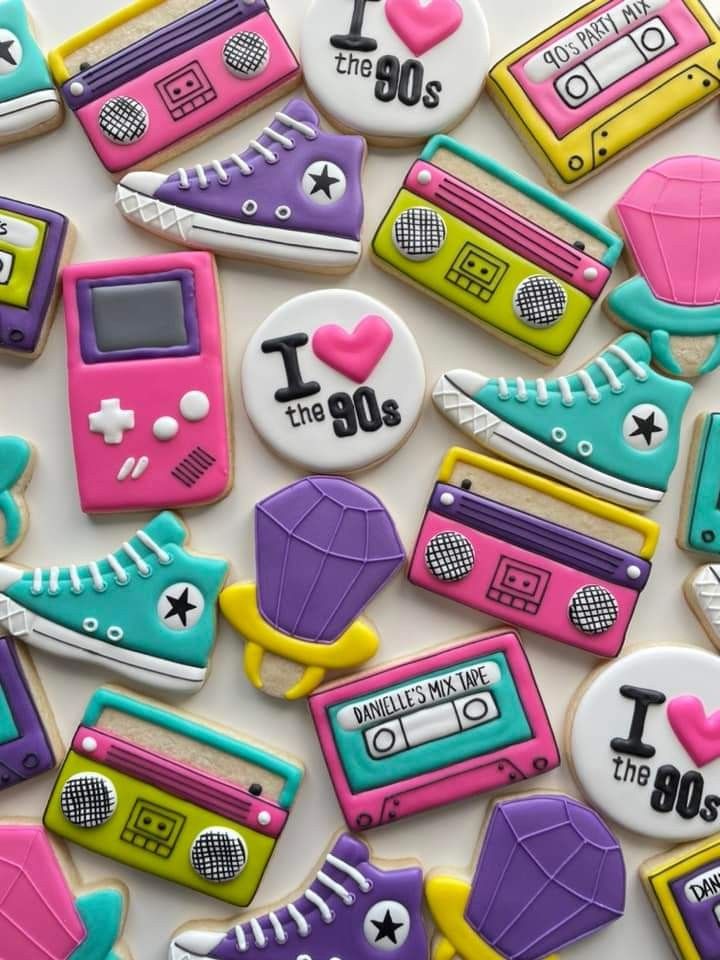 decorated cookies with various types of items on them and the words i love the 80's