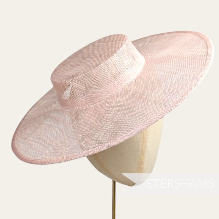 *This is not a fitted hat! You will need to attach a headband, comb or elastic to secure it to your head* Boaters are all the rage, and this rose pink sinamay fascinator version has us all in a twirl!  Made from 2 layers of stiffened sinamay, these boaters are ready to trim and have a petersham ribbon on it's inside edge. Simply add a comb or headband to secure to the head. Hat base measures: Width: 36.5cm (14.4 inches) Crown Width: Please note that the crown is on the larger side, measures 16.5 Fitted Hat With Round Crown For Kentucky Derby, Fitted Pink Hat With Short Brim, Fitted Short Brim Pink Hat, Pink Fitted Hat With Short Brim, Fitted Pink Hat With Curved Brim, Fitted Pink Hat With Flat Brim, Fitted Pink Sun Hat For Garden Party, Pink Fitted Flat Brim Hat, Adjustable Curved Brim Fascinator For Spring