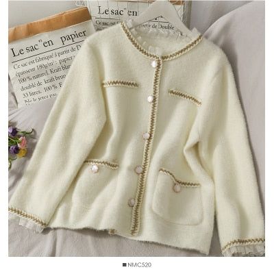 F size: shoulder 39cm bust 92-104 cm length 60cm Brand Name: hulianfuDecoration: ButtonClothing Length: ShortCollar: O-NeckSleeve Length(cm): FullSleeve Style: RegularMaterial: PolyesterMaterial: COTTONMaterial: Mink CashmereThickness: Thick （Winter)Closure Type: Single Breasted Elegant Beige Knit Outerwear, Beige Knitted Long Sleeve Cardigan, Cream Long Sleeve Cardigan, Chic Cream Crew Neck Cardigan, Elegant Knitted Long Sleeve Outerwear, Chic Beige Long Sleeve Cardigan, Elegant Beige Sweater With Buttons, Elegant Long Sleeve Knitted Outerwear, Elegant Beige Winter Cardigan