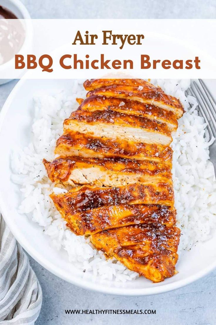 air fryer bbq chicken breast on top of rice in a white bowl with text overlay